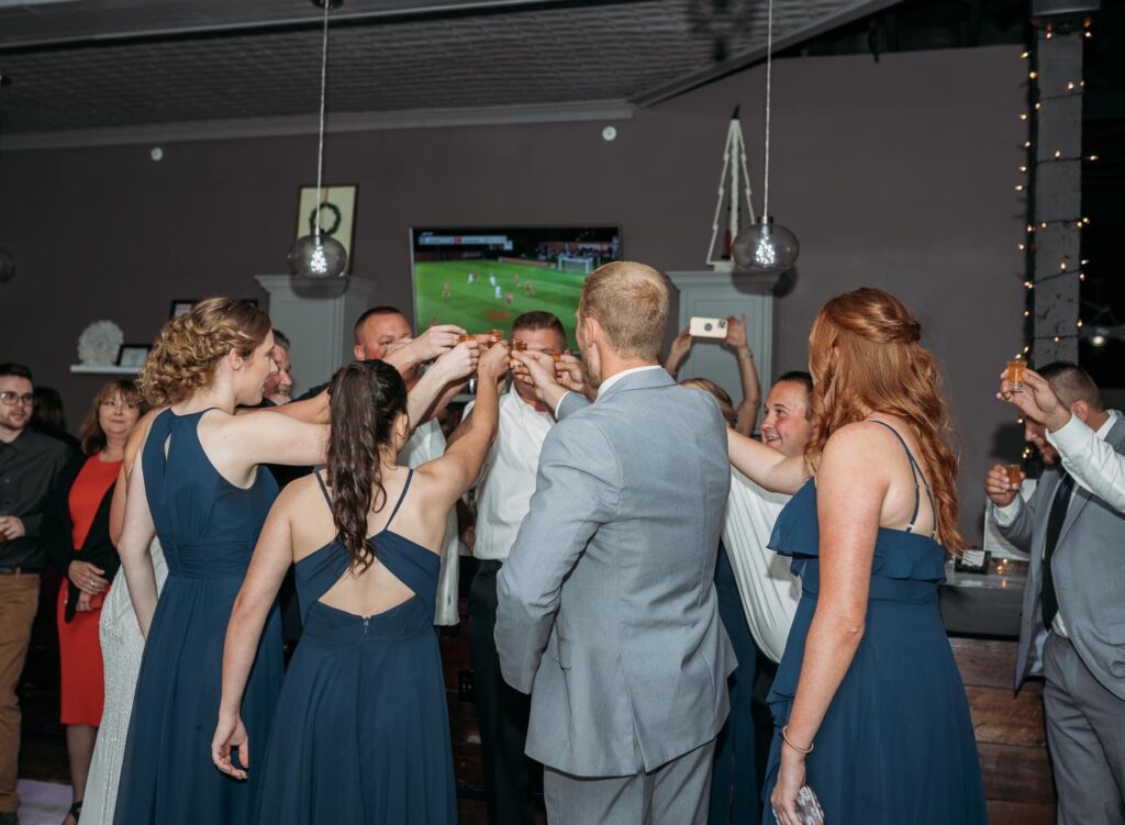 Wedding Party enjoying a reception at Meks on Main in downtown Monmouth, Illinois.